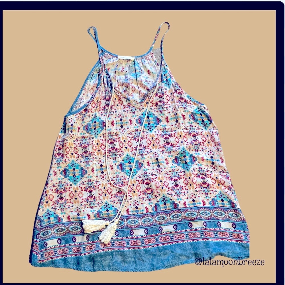 Adorable sleeveless blouse
